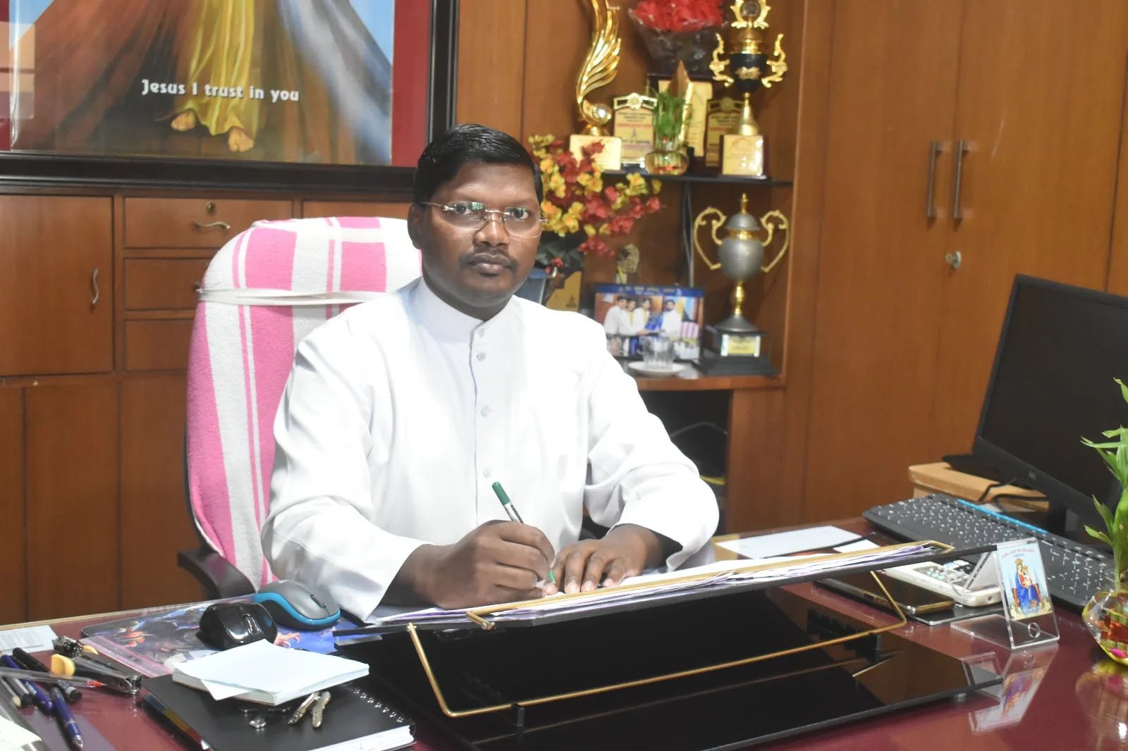 Rev. Fr. Louis Xess